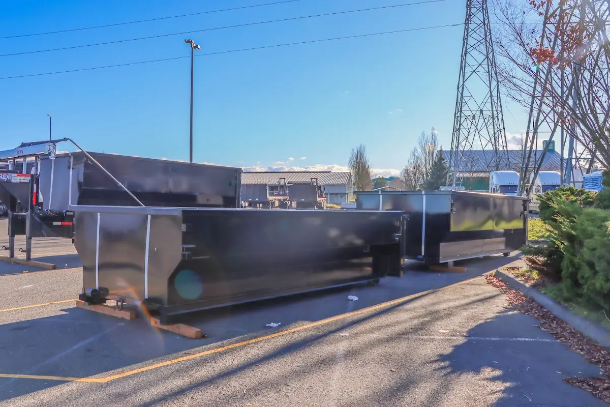 Roll-off dumpster ready for waste disposal at job site for 2 Yard Dumpster Rental in Hollins